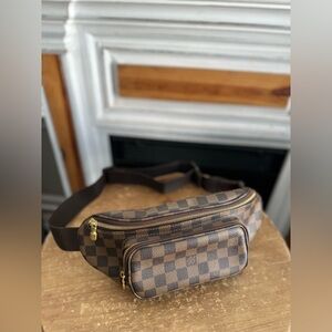 Sold on my FB. Louis Vuitton Melville Damier Ebene Bumbag Sling Brown Checkered